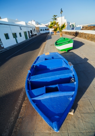 Two boats and palm on the coast の写真素材