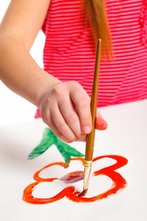 Hand girl with paintの写真素材