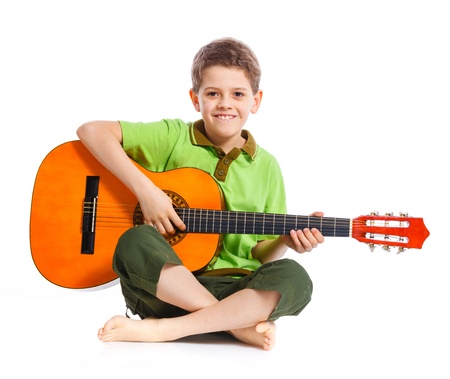 boy with classical Spanish guitarの写真素材