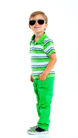 Boy with sunglasses and wearing green clothing  Isolated on white backgroundの写真素材