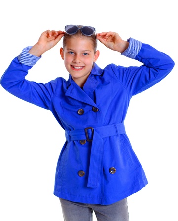 Portrait of a girl with sunglasses and wearing blue clothing  Isolated on white backgroundの写真素材