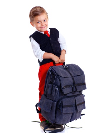 Happy schoolboy with backpack isolated on white backgroundの写真素材