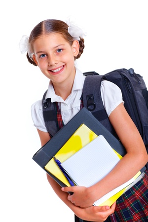 Education theme  Joyful schoolgirl smiling happily with backpack holding bookの写真素材