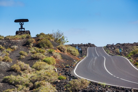 Road in Timanfaya National Park in Lanzarote, Canary Islands, Spainの写真素材