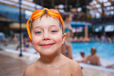 Activities on the pool  Cute boy in swimming poolの写真素材