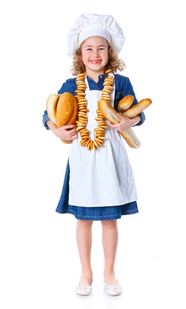 Little Cook With Bread and Bagels  Isolated on white background の写真素材