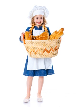 Little Cook With A Backet With Bread  Isolated on white background の写真素材
