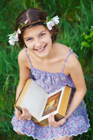 Girl in spring gardenの写真素材