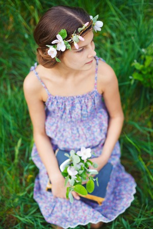 Girl in spring gardenの写真素材