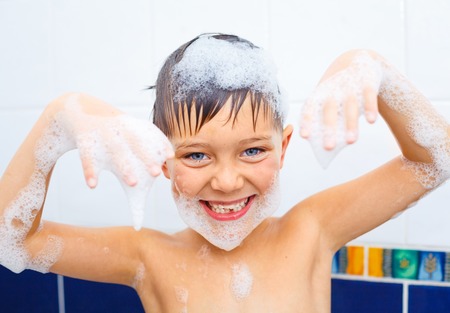 Cute boy in bathroomの写真素材