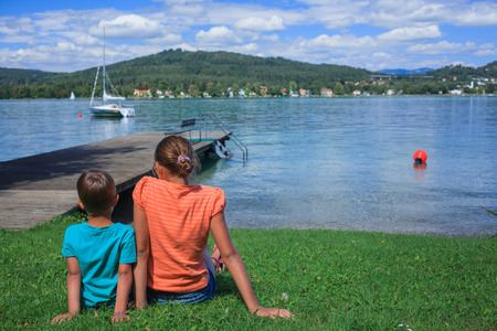 Kids at the lakeの写真素材