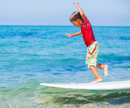 Boy with surfの写真素材