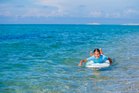 Girl with surfの写真素材