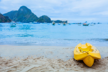 Yellow kayak on the tropical beach. Palawan, Philippinesの写真素材