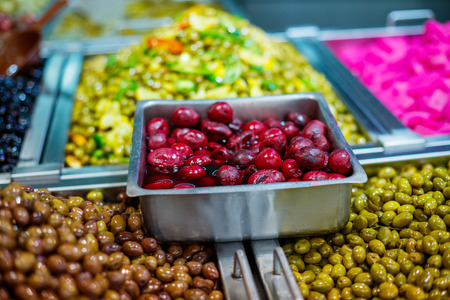 Assortment of olives on market, Tel Aviv, Israelの写真素材