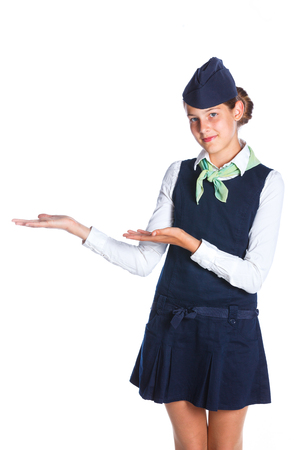 Charming Girl Stewardess Dressed In Blue Uniform On White Backgroundの写真素材