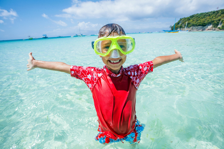 Photo of happy snorkeling boy in yellow maskの写真素材