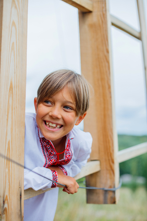 Little boy in Ukrainian embroidered shirt.の写真素材