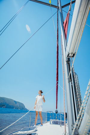 Girl relaxing On Yacht in Greeceの写真素材