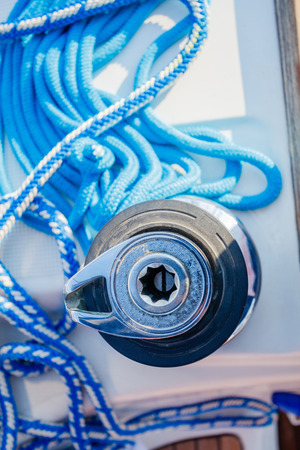Sailboat winch and rope yacht detail. Yachtingの写真素材