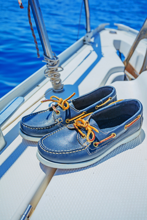 A pair of topsider on white yacht deck. Yachtingの写真素材