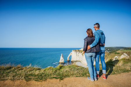 Happy couple walking in the Etretat. Franceの写真素材