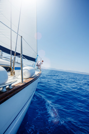 Sailing. Ship yachts with white sails in the open Sea.の写真素材