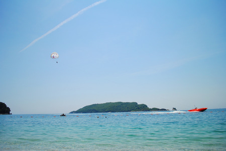 Flying high on the parachute fine entertainment and extremeの写真素材