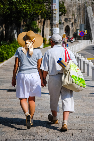 The meeting of two elderly people in the ancient city.の写真素材
