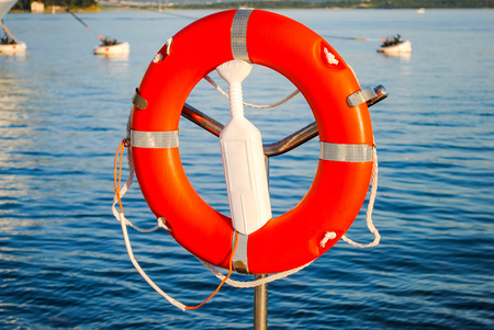 Lifebuoy on the dock in Kotor. Montenegro.の写真素材