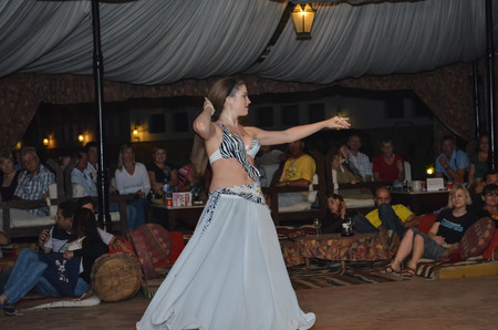 EGYPT, SHARM EL SHEIKH - DECEMBER 4/2013: Competition dancers held at the hotel.  One of the performances shown on the photo.のeditorial素材