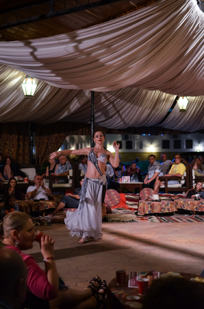 EGYPT, SHARM EL SHEIKH - DECEMBER 4/2013: Competition dancers held at the hotel.  One of the performances shown on the photo.のeditorial素材