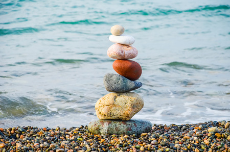Pyramid from multi-colored stones on the Black Sea in Batumi, Georgia.