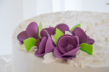 Cute wedding cake for the bride and groom.の写真素材