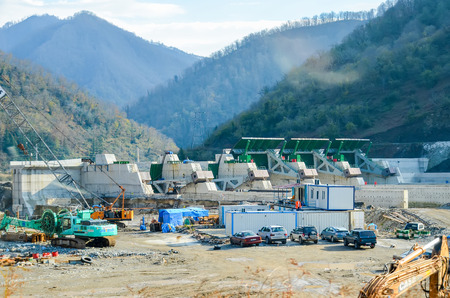 GEORGIA, BATUMI - NOVEMBER 25/2014: workers are building a power plant in the mountains near the city.のeditorial素材