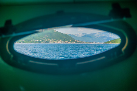 The yacht swam in the Boka-Kotorsky Bay. Montenegro.