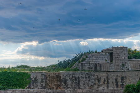 Thick stone walls of the fortress Mamula. Montenegro, Boka-Kotor Bay.の写真素材