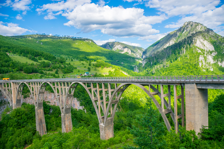 The Djurdjevic Bridge crosses the canyon of the Tara River in the north of Montenegro.の写真素材