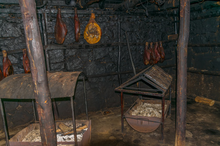 Preparation of prosciutto in rural areas in Montenegro.の写真素材