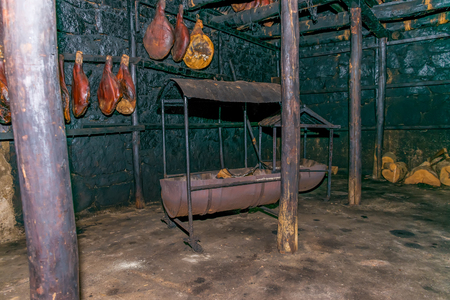 Preparation of prosciutto in rural areas in Montenegro.の写真素材