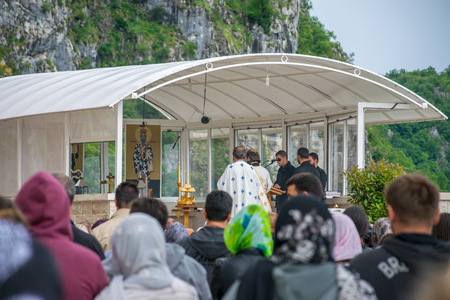 MONTENEGRO, OSTROG MONASTERY - JUNE 03/2017: prayers were held in honor of the feast of the Holy Trinity in medieval monasteries.のeditorial素材