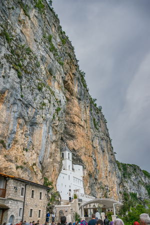 MONTENEGRO, OSTROG MONASTERY - JUNE 03/2017: prayers were held in honor of the feast of the Holy Trinity in medieval monasteries.のeditorial素材