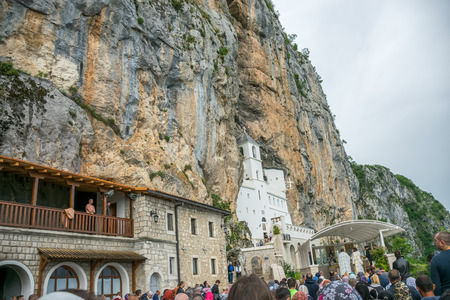MONTENEGRO, OSTROG MONASTERY - JUNE 03/2017: prayers were held in honor of the feast of the Holy Trinity in medieval monasteries.のeditorial素材
