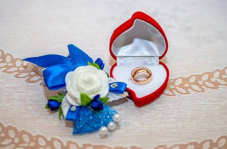Gold rings are prepared for the wedding ceremony.の写真素材