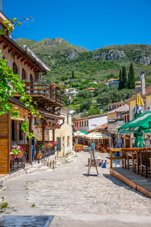 MONTENEGRO, BAR - JUNE 08/2017: Tourists walk through the quarters of the old town.のeditorial素材