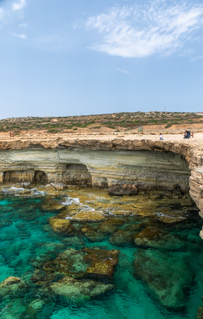 Picturesque sea caves are located on the Mediterranean coast.の写真素材