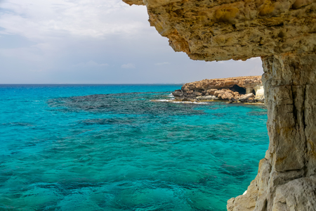 The unusual picturesque cave is located on the Mediterranean coast. Cyprus, Ayia Napa.の写真素材