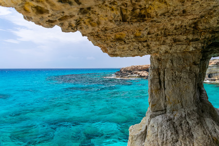 The unusual picturesque cave is located on the Mediterranean coast. Cyprus, Ayia Napa.の写真素材