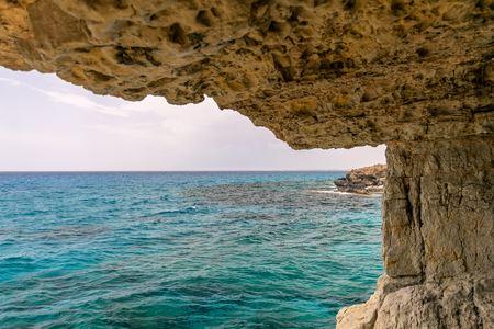 The unusual picturesque cave is located on the Mediterranean coast. Cyprus, Ayia Napa.の写真素材