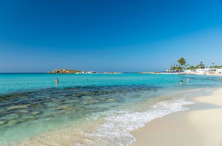 The most famous beach of Cyprus with crystal clear water. Nissi Beach.の写真素材